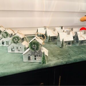 Charming Holiday House Ornament with Green Accents